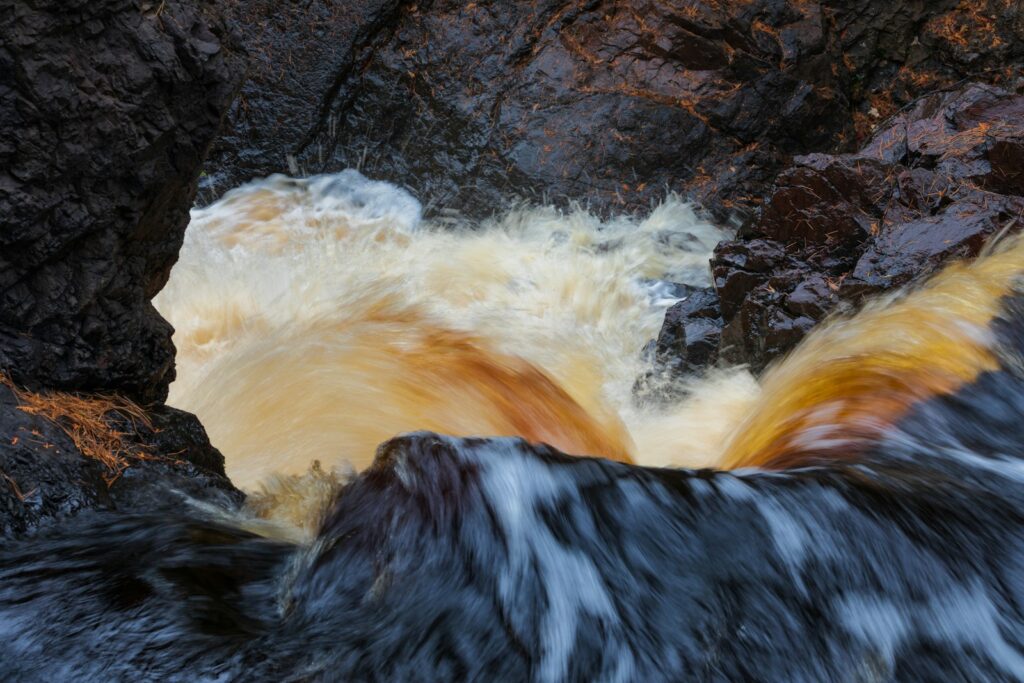 Waterfall rushing over rocks